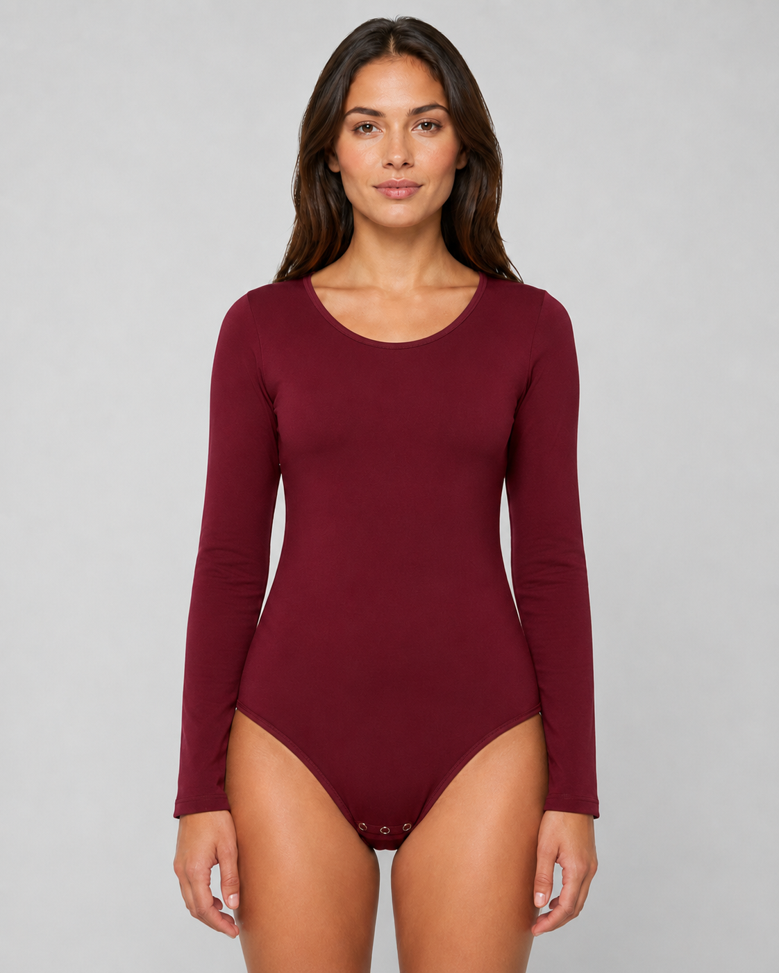 Bodystocking med lång ärm och tryckknappar nedtill finns i grönt, vitt, svart och bordeaux.