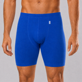 Boxer shorts för blöjfixering, med bred grenkonstruktion, finns i koboltblå, vit och svart.