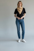 Care Design beige square bib scarf with 4 absorbent layers and snap closure. Folds into a bandana style.
