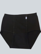 Care Design black adaptive underwear with front snap closures for easy dressing and care. Suitable for incontinence products.