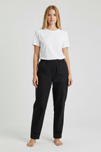 Care Design black stretch denim trousers with full side zips for easy dressing, elastic waist, no pockets.