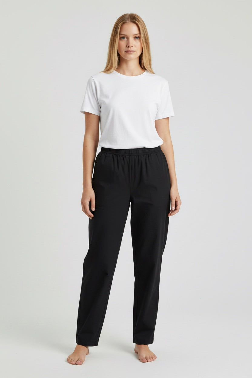 Care Design black stretch denim trousers with full side zips for easy dressing, elastic waist, no pockets.