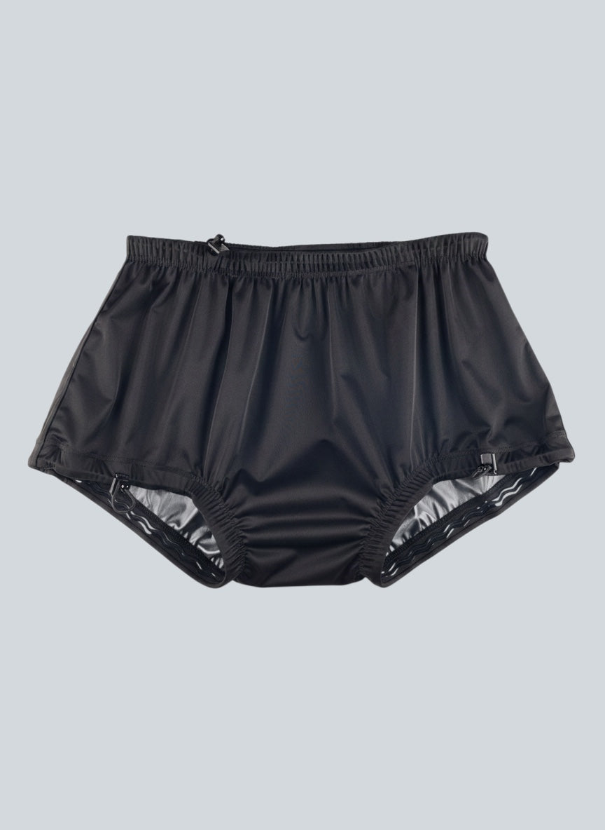 Care Design black polyester incontinence pants for children with built-in leak barrier and elasticated waist and leg openings.