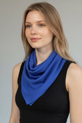 Care Design blue absorbent bandana scarf with snap closure, 4 layers, for drooling adults or children.