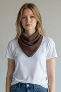 Care Design brown corduroy bandana bib with snap closure, 4 absorbent layers, 3 sizes available.