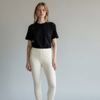 Care Design cream 100% wool leggings with lace trim at ankles. Women's thermal underwear.
