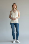 Care Design "Marie" women's ivory 100% wool tank top. Facon-cut with a scoop neck, perfect for warmth and breathability.