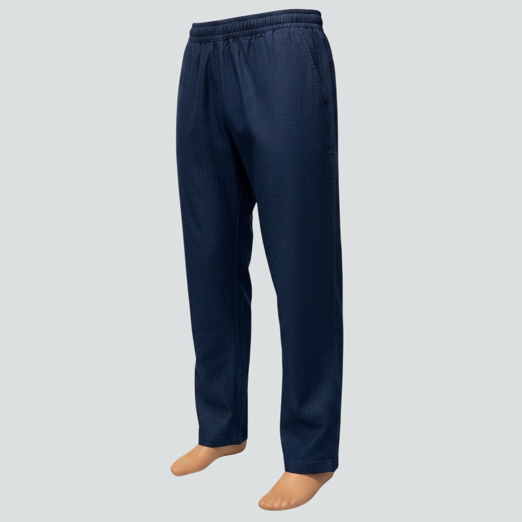 Care Design dark blue denim trousers with full-length leg zips and warm lining. Elasticated waist.
