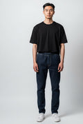 Care Design dark blue denim trousers with full-length leg zips and warm lining. Elastic waist, no pockets.