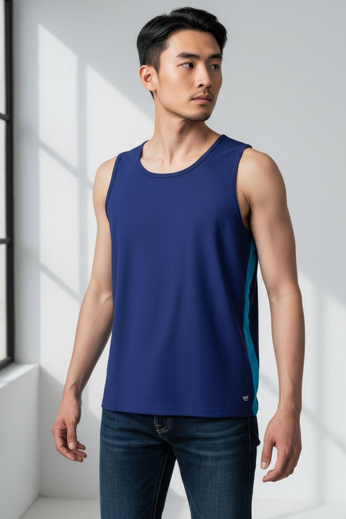 Care Design men's navy blue tank top with a bright blue side stripe. Loose fit, designed for comfort and to camouflage a stoma.