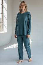Care Design teal long-sleeve unisex t-shirt made from cotton/lycra with a round neck and cuffed sleeves and hem.