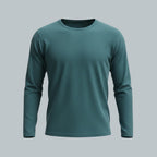 Care Design teal long-sleeved pyjama top with black pyjama bottoms. Comfortable loungewear set.