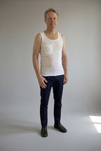 Care Design white 100% cotton tank top with a discreet pocket for central venous catheter tubing.
