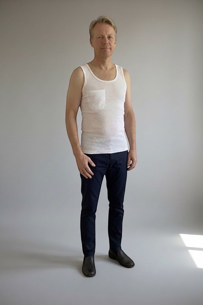 Care Design white 100% cotton tank top with a discreet pocket for central venous catheter tubing.
