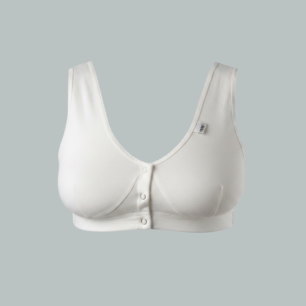 Care Design white cotton-blend bra with front snap closure, wide straps, and scalloped trim. Ideal for large busts or sensitive skin.