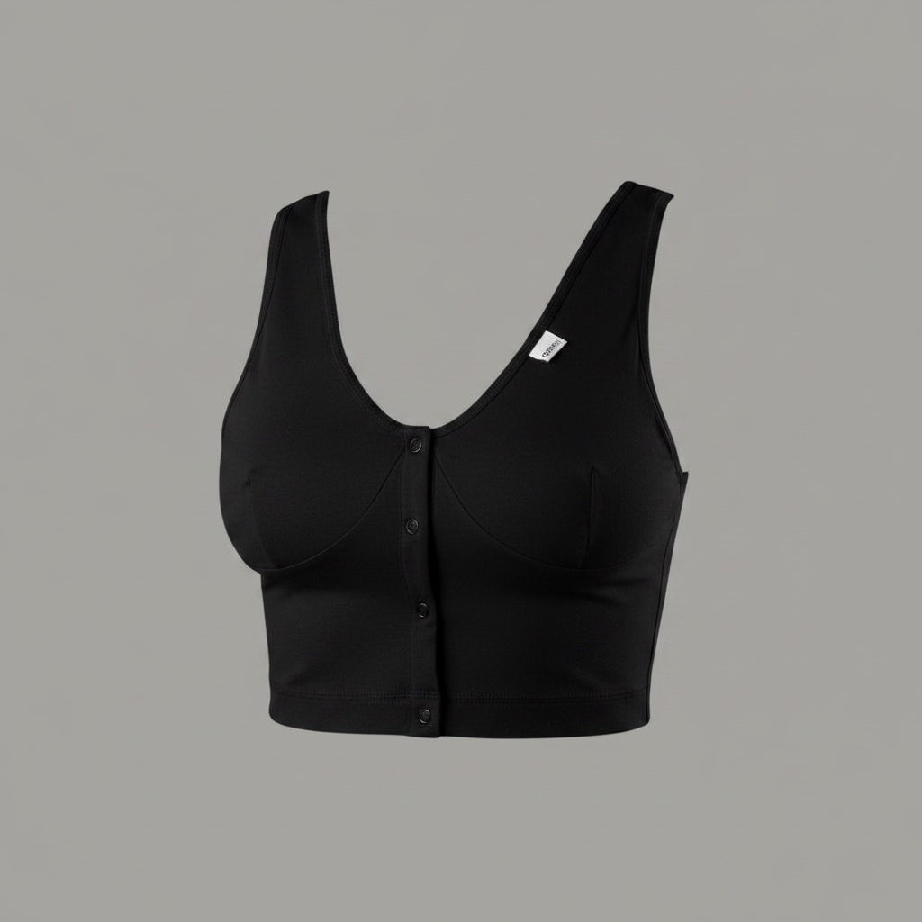 Care Design white cotton-lycra support bra with front snap closure, wide straps, and wide underbust band for large busts and sensitive skin.