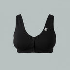 Care Design white cotton-lycra support bra with front button closure, wide straps, and comfortable fit for large busts and sensitive skin.