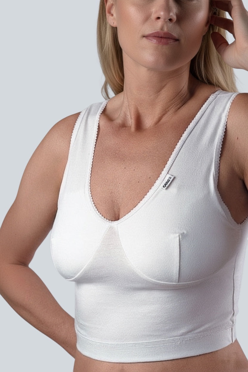 Care Design white cotton-lycra support bra with wide straps and band, ideal for large busts and sensitive skin.