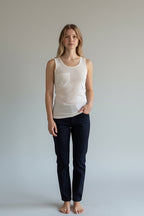 Care Design white 100% cotton vest with pocket for central venous catheter tubing.