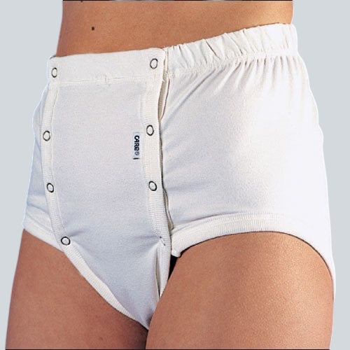 Care Design white cotton incontinence pants with front snap closures for easy dressing and care.