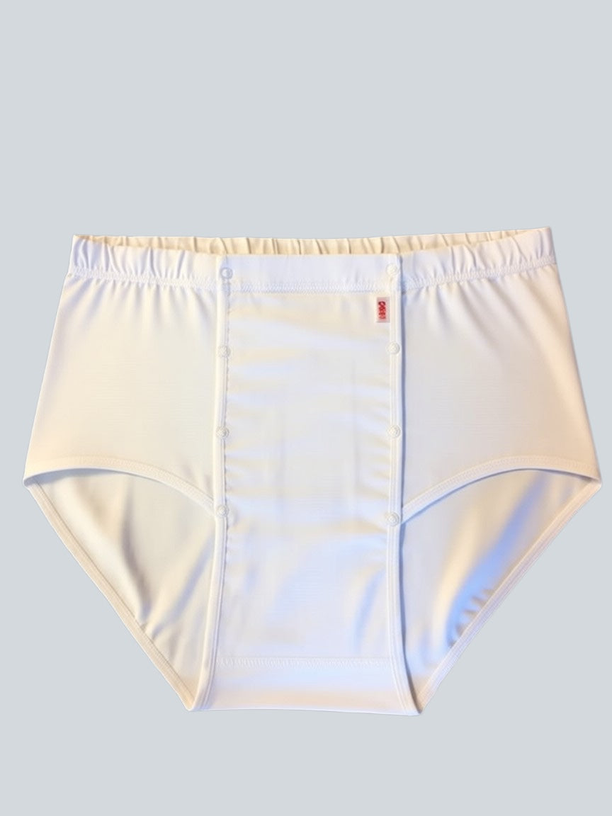 Care Design white cotton incontinence pants with front snap closures for easy dressing and care.