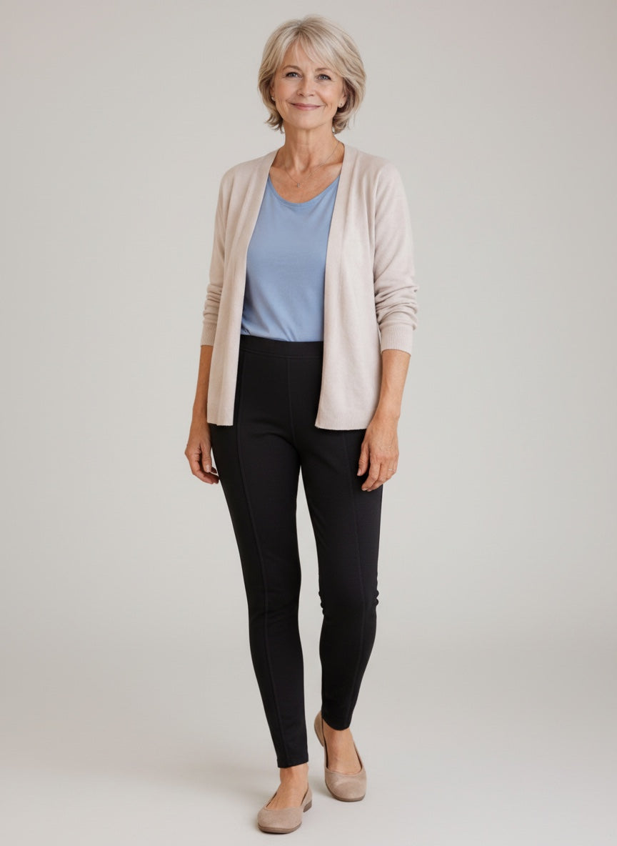 Care Design women's black 100% wool thermal leggings, Woolmark certified for quality and warmth.