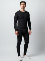 Care Design black 100% wool thermal leggings for men, Woolmark certified for purity and quality.