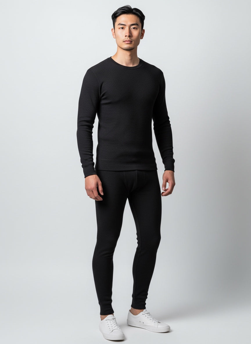 Care Design black 100% wool thermal leggings for men, Woolmark certified for purity and quality.
