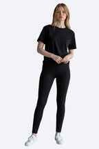 Care Design black 100% wool thermal leggings for women, Woolmark certified for quality and warmth.
