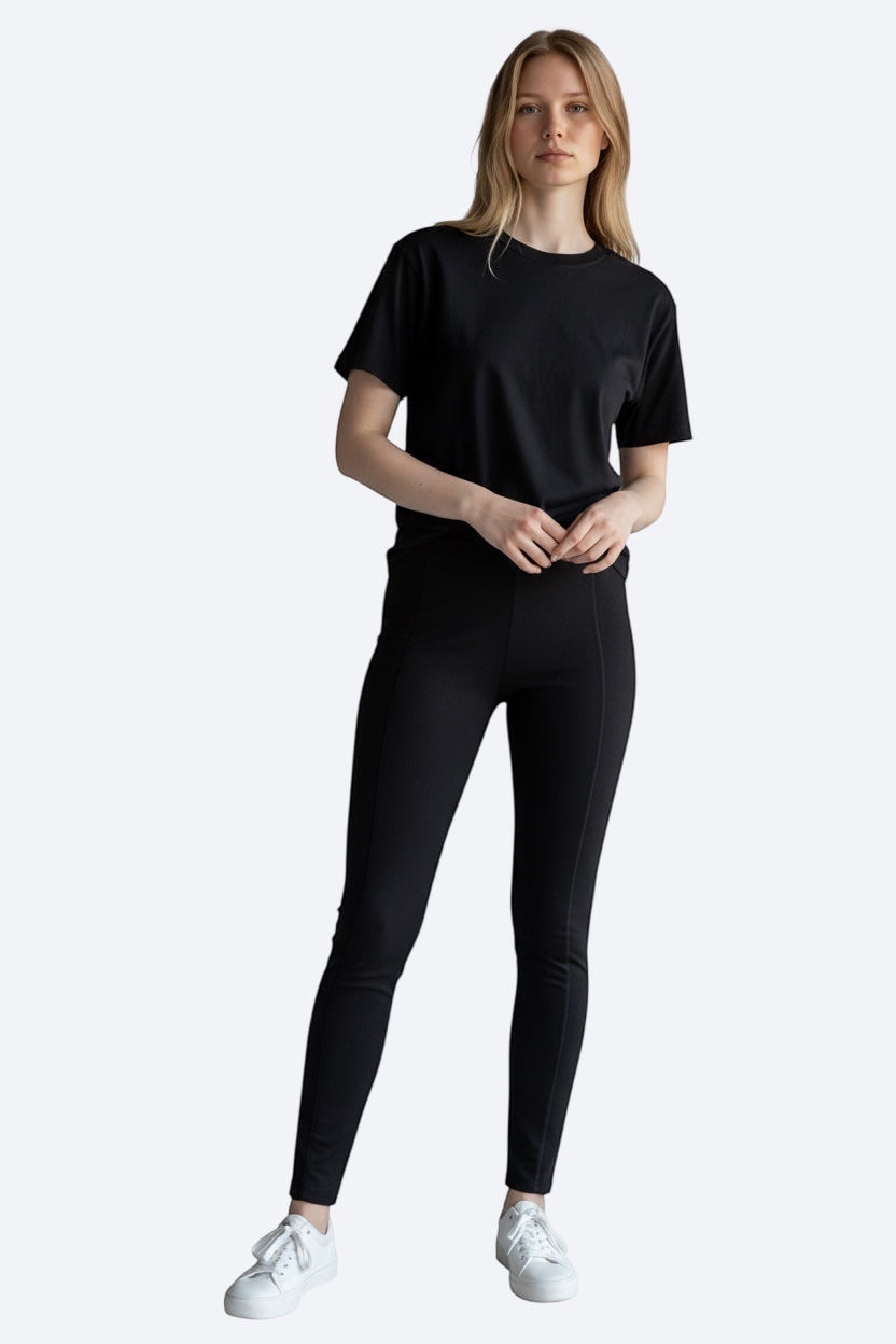 Care Design black 100% wool thermal leggings for women, Woolmark certified for quality and warmth.