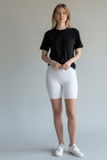 Care Design white high-waisted fixation briefs with leg, designed for secure fastening of pads and diapers.
